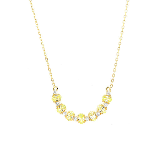 Sterling Jewellers' Ovale Verde Mezzaluna Crescent Necklace in Yellow Gold Plating with Apple Green Stones from the new Ovale Collection
