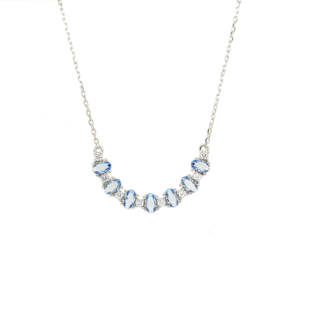 Sterling Jewellers' Ovale Mezzaluna Crescent Necklace in Rhodium Plating with Aqua Blue Stones from the new Ovale Collection